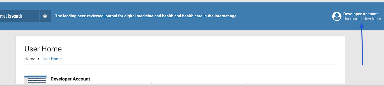 Arrow pointing at top right hand corner of user home screen